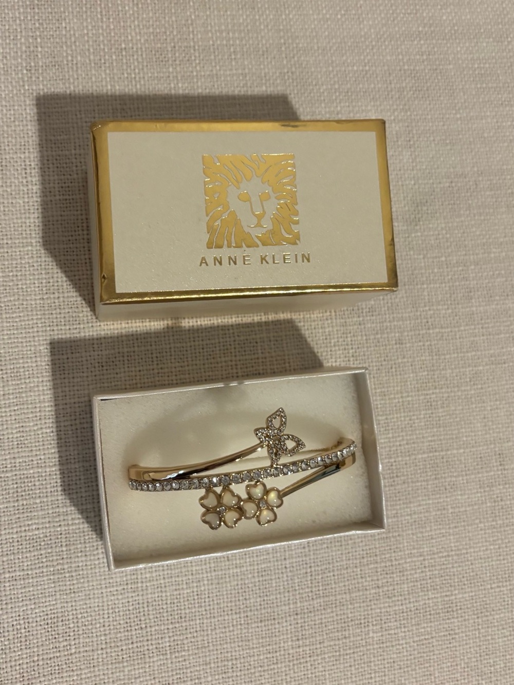 Anne Klein Gold and White Floral Crystal Hinged Bangle Bracelet